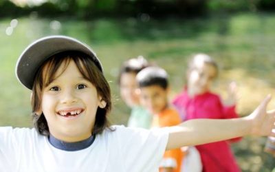 image of young boy with arms open